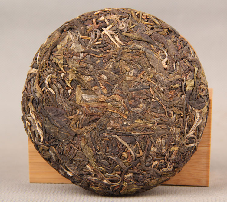 2014 Yunnan Lincang raw Koláč 100g 