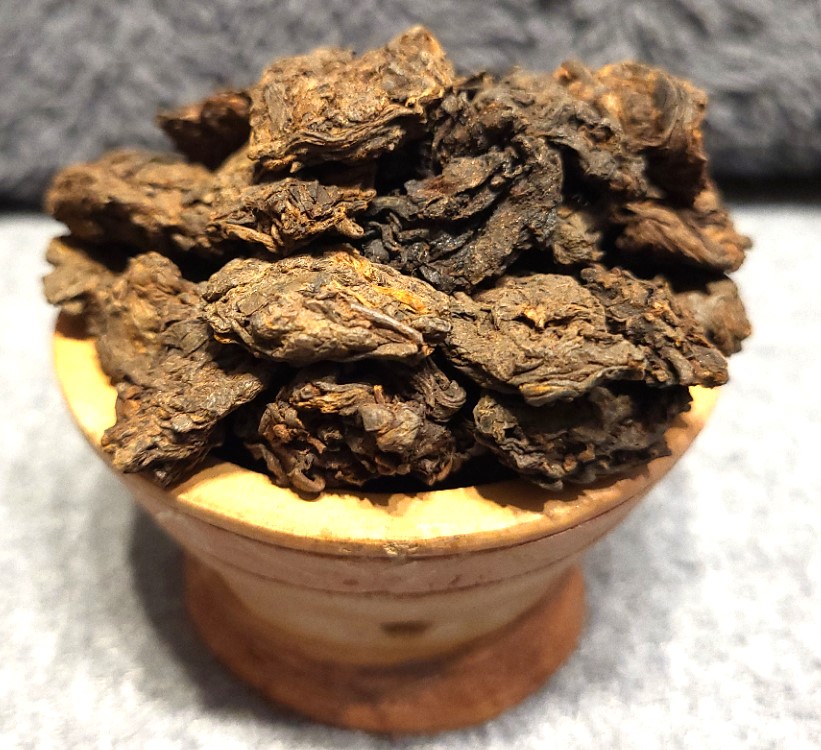 2011 Luzhou old tea heads Puer in leather barrel 500g
